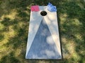 Cornhole yard game board and bean bags Royalty Free Stock Photo