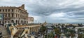 View on the corniche facing the port of Algiers and the Haussmann buildings under cloudy sky in algiers