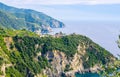 Corniglia traditional typical Italian village with colorful buildings on rock cliff and Manarola