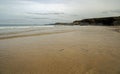 Cornish beach scene in November showing rocks and the sea Royalty Free Stock Photo