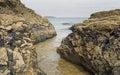 Cornish beach scene in November showing rocks and the sea Royalty Free Stock Photo