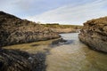 Cornish beach scene in November showing rocks and the sea Royalty Free Stock Photo