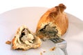 Cornish pasty broken open and fork Royalty Free Stock Photo