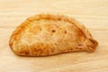 Cornish pasty on wood Royalty Free Stock Photo