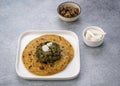 Cornmeal breads and  mustard leaves curry, famous Indian food specially prepared in winters, makki ki roti - sarson ka saag Royalty Free Stock Photo