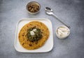 Cornmeal breads and  mustard leaves curry, famous Indian food specially prepared in winters, makki ki roti - sarson ka saag Royalty Free Stock Photo
