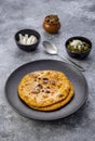 Cornmeal breads and  mustard leaves curry, famous Indian food specially prepared in winters, makki ki roti - sarson ka saag Royalty Free Stock Photo