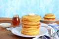 Cornmeal pancakes on a white plate