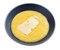 Cornmeal porridge with piece of brined cheese