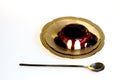 cornstarch dessert with red wine sauce, chilean dessert, top view