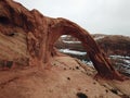 Aerial view of a sandstone arch in Moab Utah