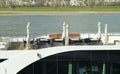 Corona lockdown for rivercruises, deck of cruiseship with empty chairs and interfolded sunshades Royalty Free Stock Photo