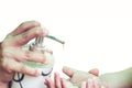 Corona virus or COVID-19 pandemic prevention, Mother put hand sanitizer to her daughter hand. wash hands with Alcohol based hand Royalty Free Stock Photo