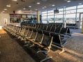 Empty Seats At Airport Departure Terminal