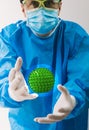 Scientist looks attentively at a virus floating in the air Royalty Free Stock Photo