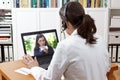 Telemedicine concept: doctor during a video consult with a coughing patient. Royalty Free Stock Photo