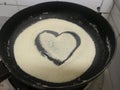 During corona virus pandemic quarantine i was trying to cook semolina and drawn this love symbol to show i love cooking in heart