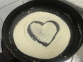 During corona virus pandemic quarantine i was trying to cook semolina and drawn this love symbol to show i love cooking in heart