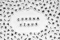 CORONA VIRUS written with white circles isolated on a white background surrounded by white circles alphabet Royalty Free Stock Photo