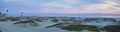 Coronado Beach in San Diego by the Historic Hotel del Coronado, at sunset with unique beach sand dunes, panorama view of the Pacif Royalty Free Stock Photo