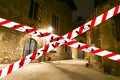 Coronavirus in Barcelona, Spain. Covid-19 sign. Concept of COVID pandemic and travel in Europe. Gothic quarter at night. Royalty Free Stock Photo