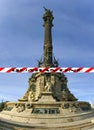 Coronavirus in Barcelona, Spain. Quarantine sign. Concept of COVID pandemic and travel in Europe. Chistopher Columbus monument