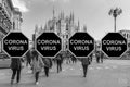 Coronavirus on black sign in front of the Milan Cathedral in Italy