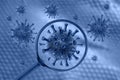 Coronavirus cell view through a magnifying glass Royalty Free Stock Photo