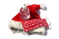 Coronavirus Christmas. Santa Claus Hat with Face Mask and Hand Sanitizer. Covid-19 Christmas. Covid-19 Face Mask with Santa Hat