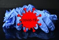 Coronavirus, concept.Disposable blue medical latex gloves on black background. Hygiene rules during the coronavirus epidemic.Healt