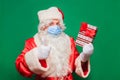 Coronavirus. Convid-19. Santa Claus wears a face mask to prevent CORONAVIRUS. Royalty Free Stock Photo