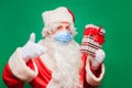 Coronavirus. Convid-19. Santa Claus wears a face mask to prevent CORONAVIRUS. Royalty Free Stock Photo