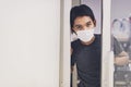 Coronavirus or covid-19. Asian men wearing mask protection, work from home with disinfectant gel Royalty Free Stock Photo