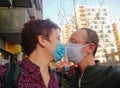 Coronavirus COVID-19 couple wearing protective mask