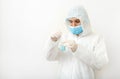 Coronavirus, covid-19. Doctor or scientist in protective medical suit, biological hazard, face mask creating vaccine in laboratory