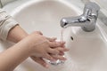 Coronavirus, covid-19, girl, boy, washing hands with soap and water to prevent infection and diseases by viruses Royalty Free Stock Photo