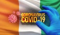 Coronavirus COVID-19 outbreak concept, health threatening virus, background waving national flag of Cote Ivoire Royalty Free Stock Photo