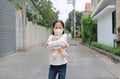 Coronavirus covid-19 and pollution protection concept. Asian little child girl hugging teddy bear doll with wearing mask to Royalty Free Stock Photo