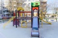 Coronavirus COVID-19 restriction. No people due to quarantine. Closed children`s playground in the city. Empty park and Royalty Free Stock Photo