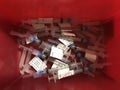 Coronavirus and COVID-19 vaccine hypodermic needles and syringes. Spent Moderna vaccines discarded in a sharps bin Royalty Free Stock Photo