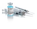 Coronavirus COVID-19 Vaccine Vial and Several Syringes On Reflective Surface