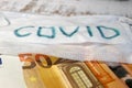 Coronavirus crisis in europe wallpaper new ncov 2019 virus medical mask with the inscription covid with fifty euro banknote