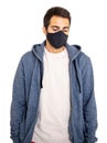 Man with coronavirus protective face mask, wearing a blank t shirt and gray color hoodie isolated against white background, Royalty Free Stock Photo