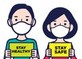 Woman and man wearing protective surgical masks holding a Stay Safe and stay healthy signboards
