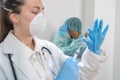 Coronavirus. Doctors and nurses working in the hospitals and fighting the coronavirus. Female doctor in the protective suit and ma