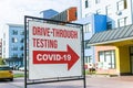 Coronavirus drive-through testing sign and arrow