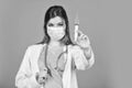 coronavirus epidemic from china. selective focus. woman doctor use syringe. nurse make injection in respirator mask Royalty Free Stock Photo