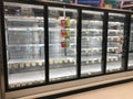 Empty freezer shelves in a grocery store