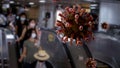 Coronavirus floating on air while travellers wear mask at metro station Royalty Free Stock Photo