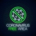 Coronavirus free areaneon sign. COVID-19 virus caution symbol in neon style. Coronavirus outbreak stop icon